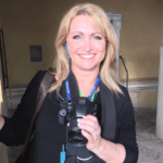 Photo of Rhonda Erb with fancy camera in Italy